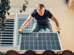A Man Installing Solar Panel
